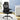 Black office chair in a room with a desk and plants