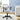 Gray office chair in a room with a desk and plants