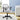 Gray office chair in a room with a desk and plants