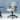 Gray office chair with mesh backrest in a minimalistic room.