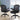 Two black office chairs in an office setting with a cityscape view.