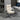 Beige office chair in a modern office setting with a desk and computer monitor.