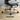 Office chair with chrome base on a wooden floor