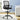 Black office chair in a room with a desk and plant